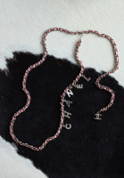 Светло-розовый пояс Chanel с подвесками