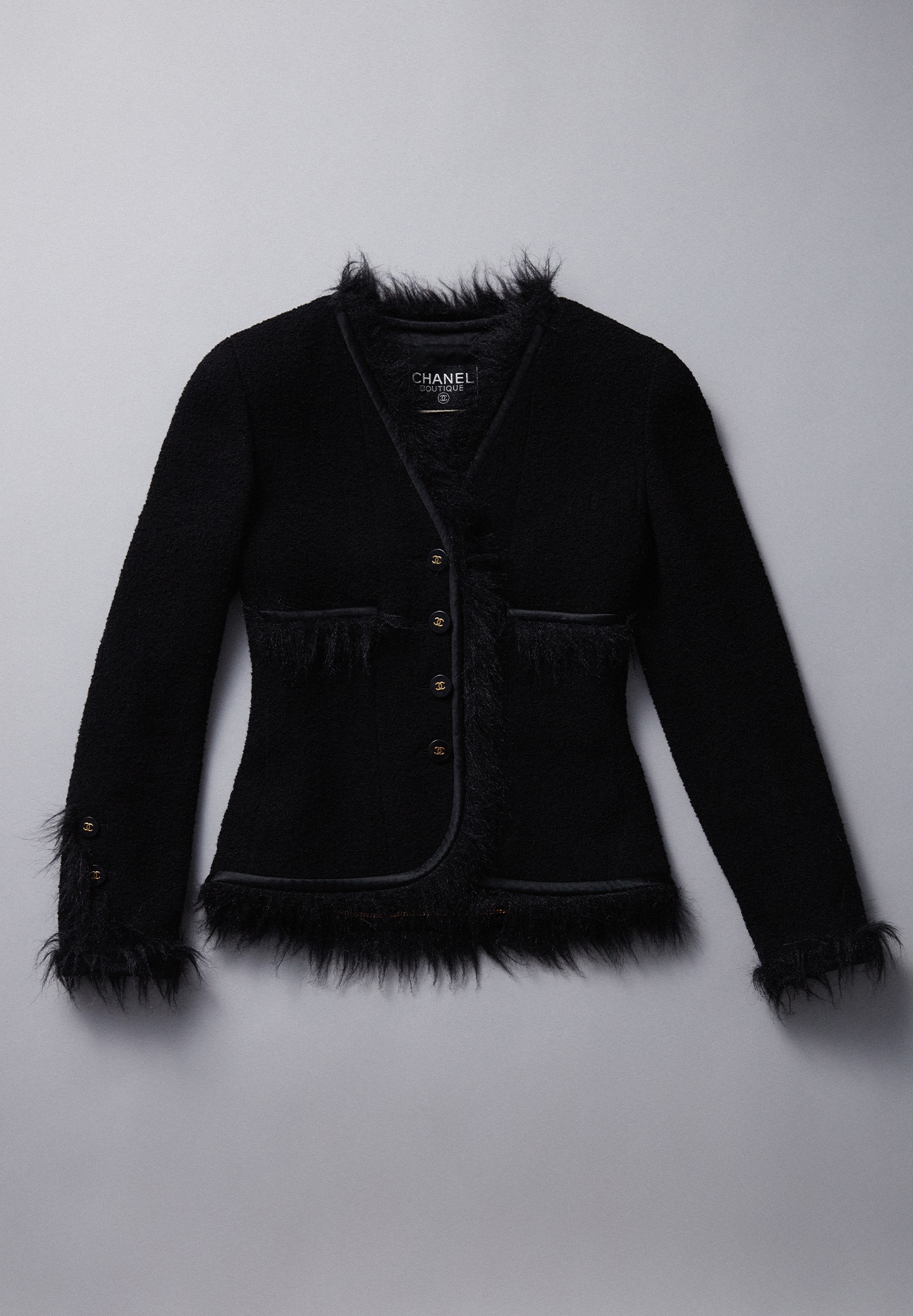 Твидовый жакет Chanel с меховой оторочкой