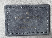 Серая сумка Louis Vuitton Nimbus с монограммами