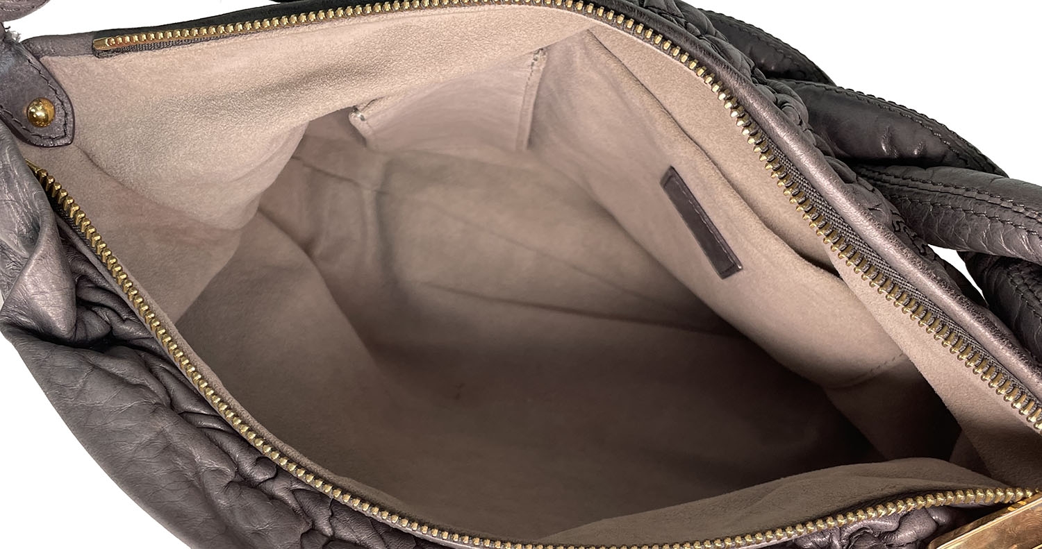 Серая сумка Louis Vuitton Nimbus с монограммами