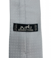 Шелковый галстук Hermès с логотипами