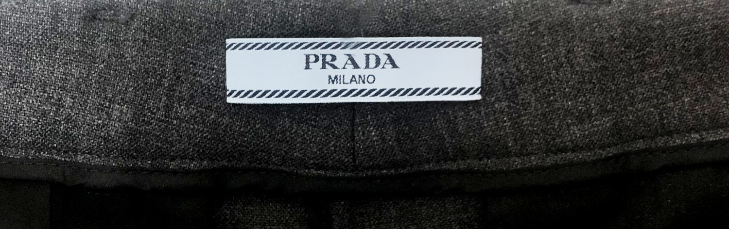 Серые брюки Prada