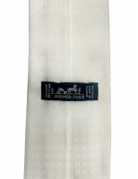 Шелковый галстук Hermès с логотипами