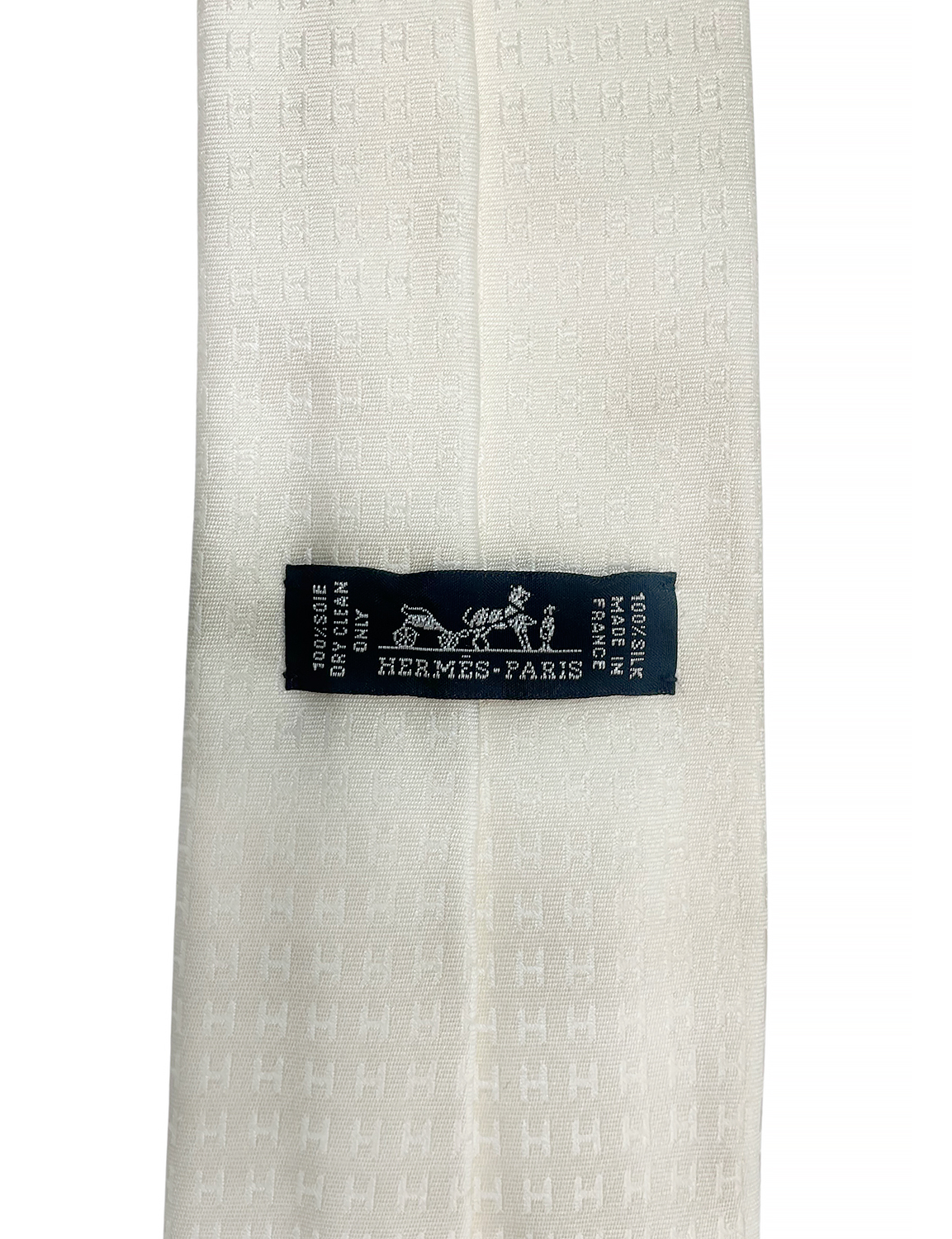 Шелковый галстук Hermès с логотипами