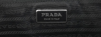 Лаковый клатч Prada