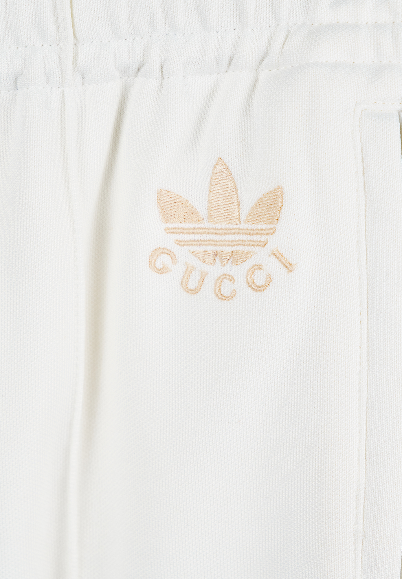 Белые брюки Gucci x Adidas 