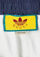 Белые брюки Gucci x Adidas 