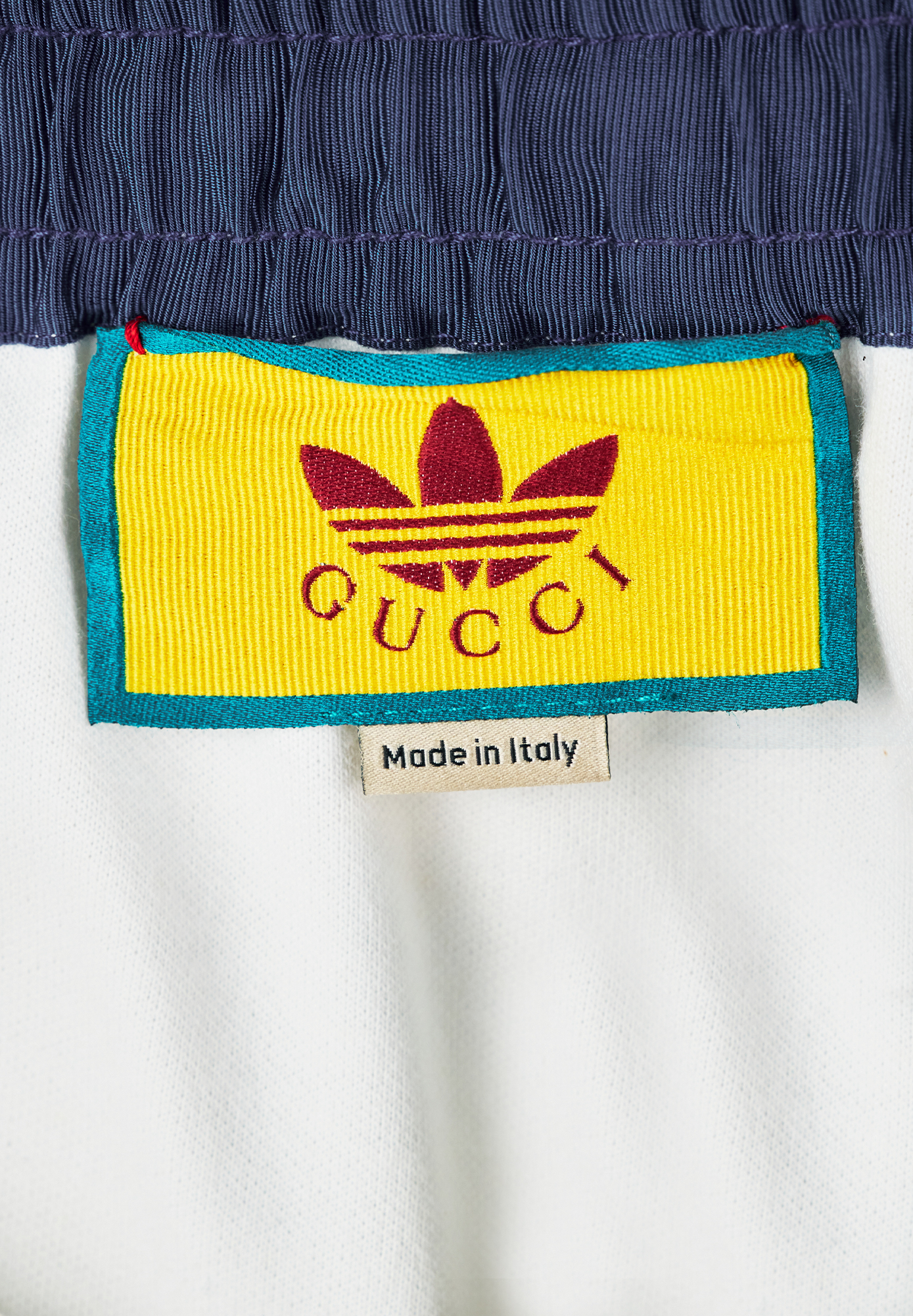Белые брюки Gucci x Adidas 