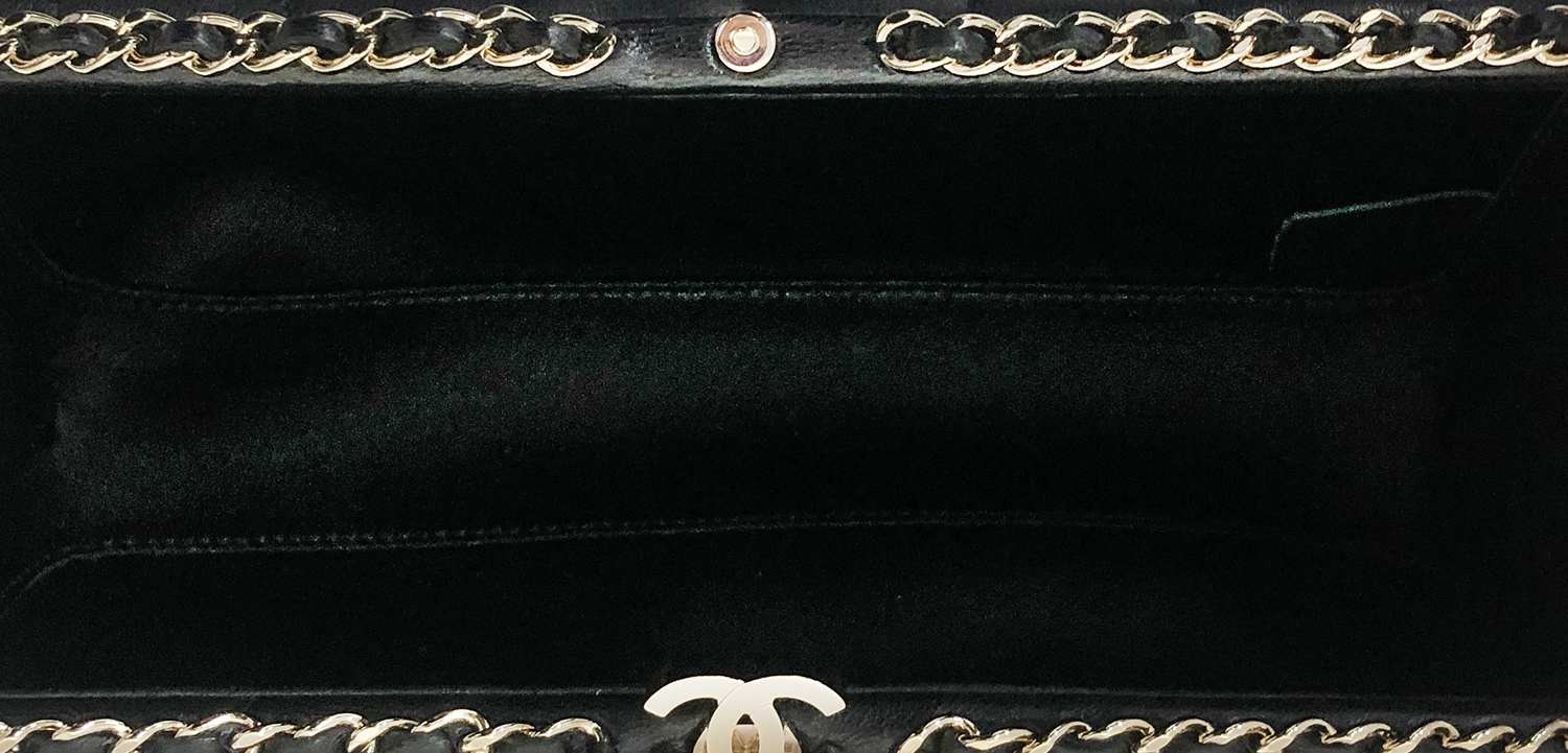 Стёганый чёрный клатч Chanel