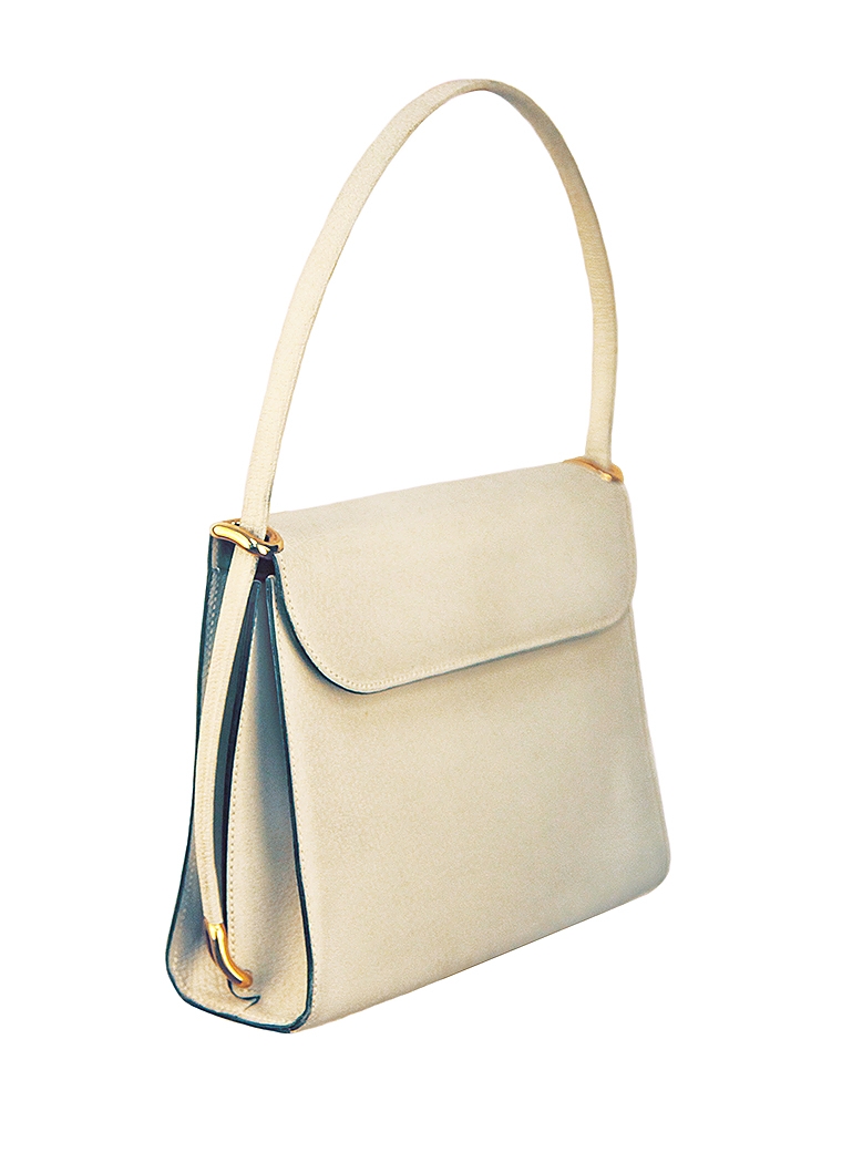 Бежевая сумка Christian Dior