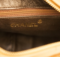 Коричневая сумка Chanel с кисточкой