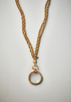Колье Chanel с подвеской-лупой