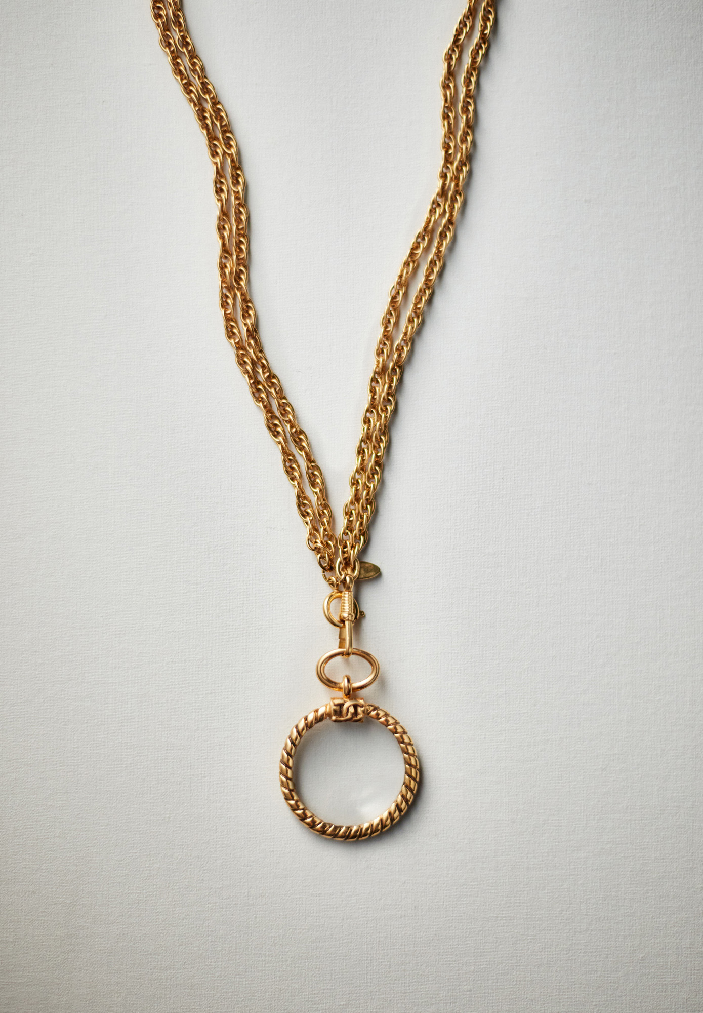 Колье Chanel с подвеской-лупой