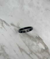 Черный браслет Chanel с звездами