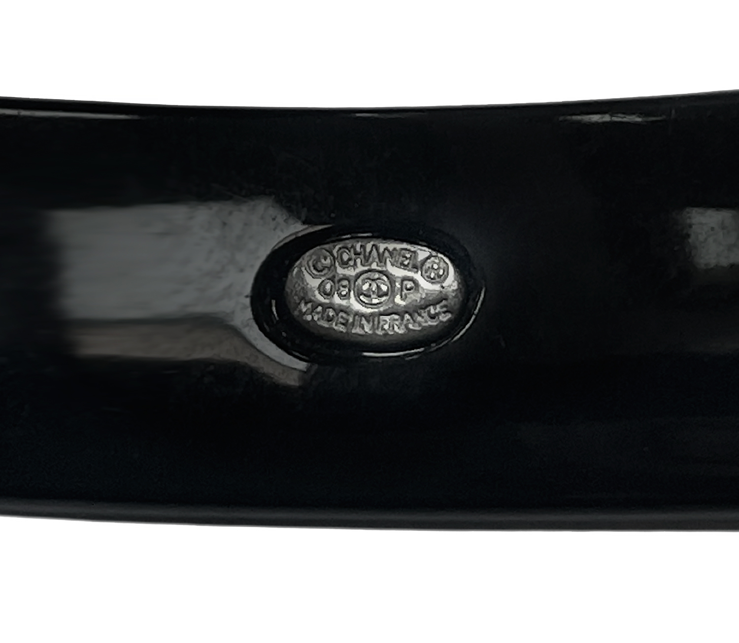 Черный браслет Chanel с звездами