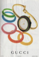 Часы Gucci 1100-L с разноцветными сменными безелями