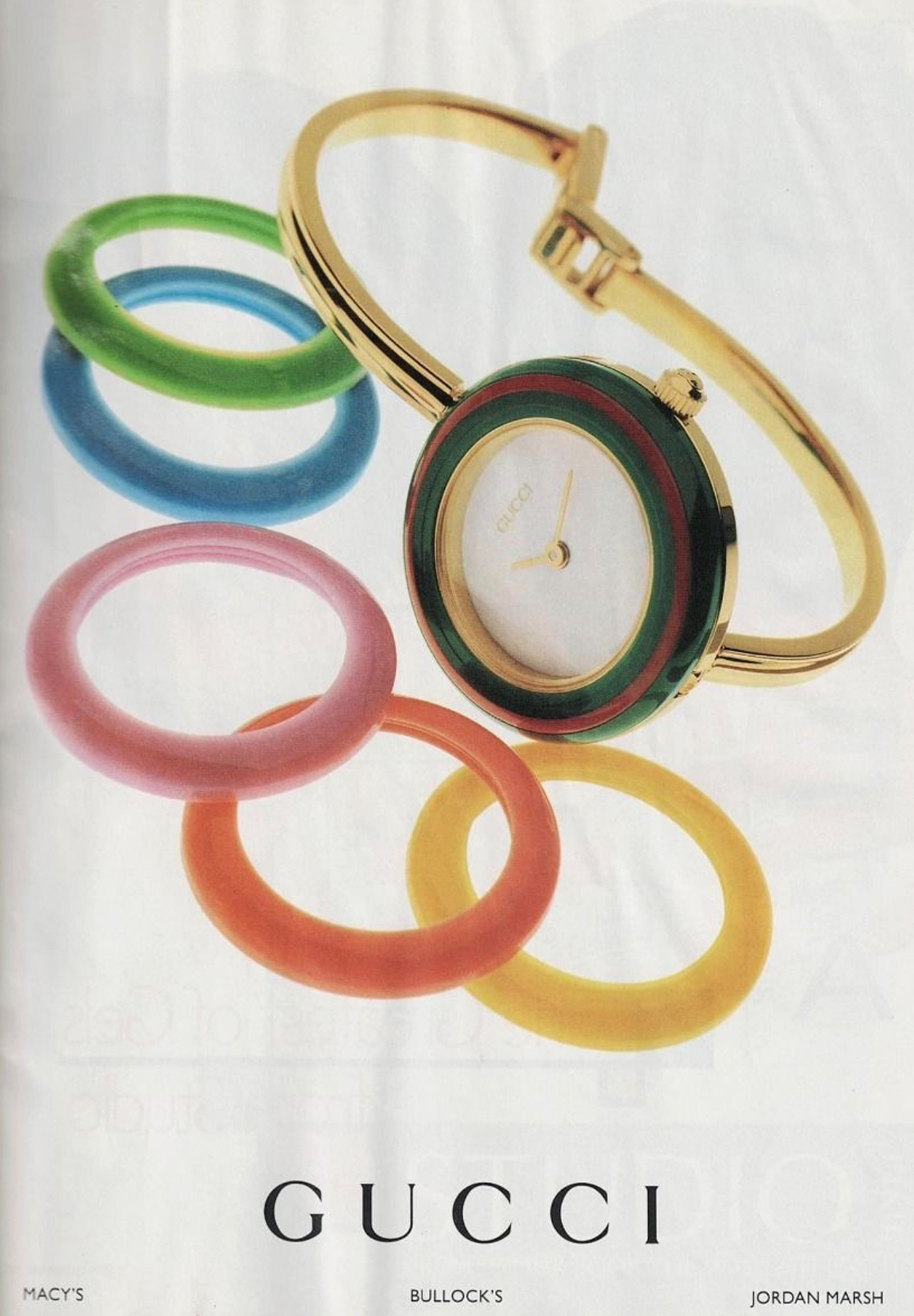 Часы Gucci 1100-L с разноцветными сменными безелями