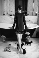 Золотой клатч Yves Saint Laurent с шелковыми кистями