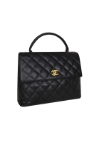 Стеганая сумка Chanel Kelly Flap
