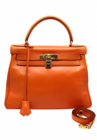 Ярко-оранжевая сумка Hermès Kelly 28