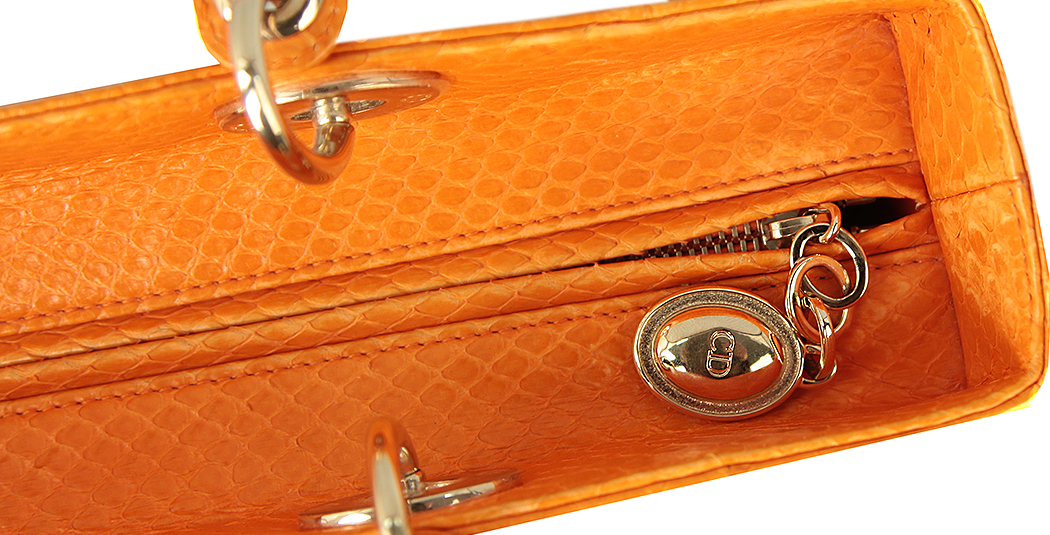 Оранжевая сумка Lady Dior