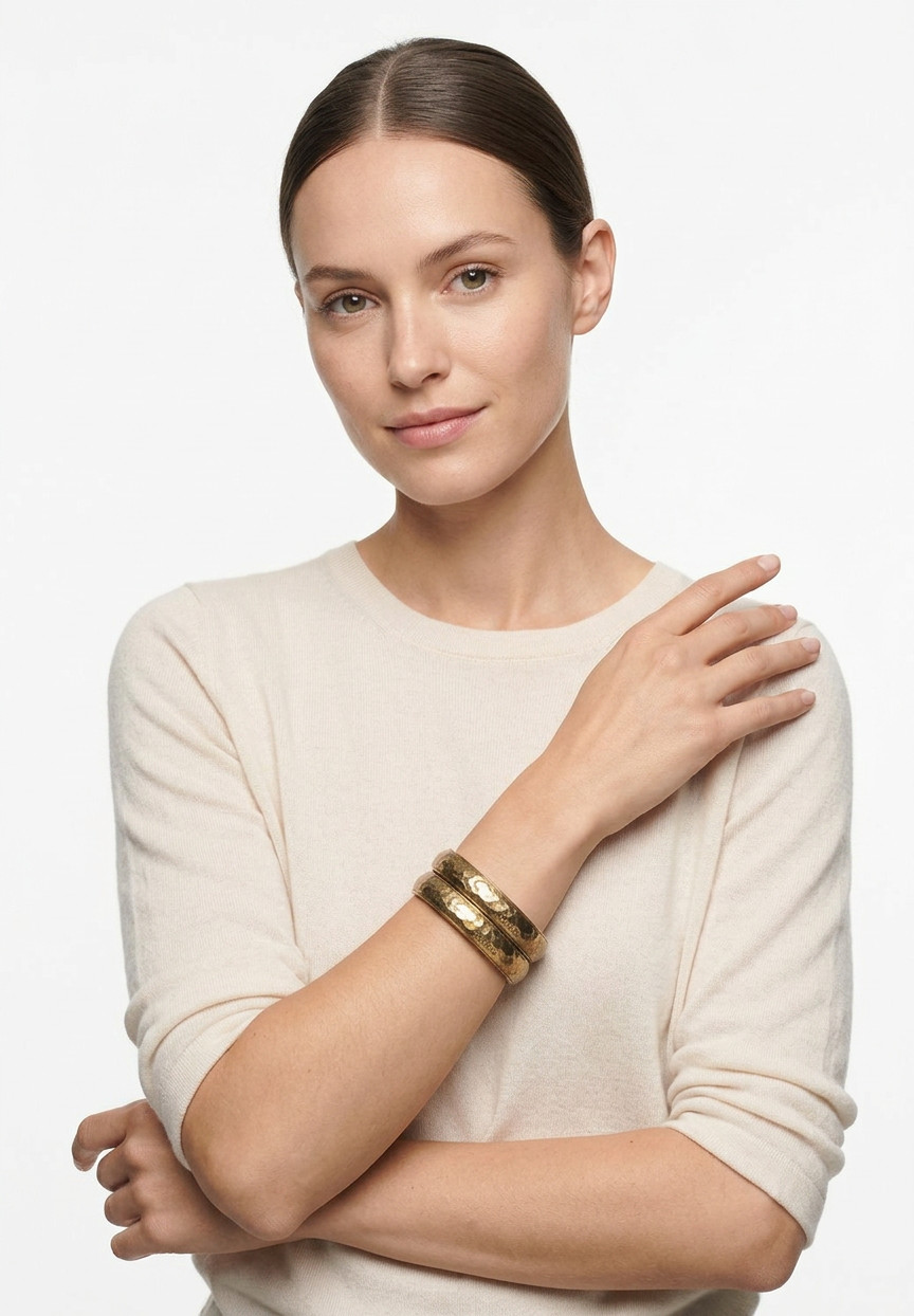 Сет из золотистых браслетов Chanel 