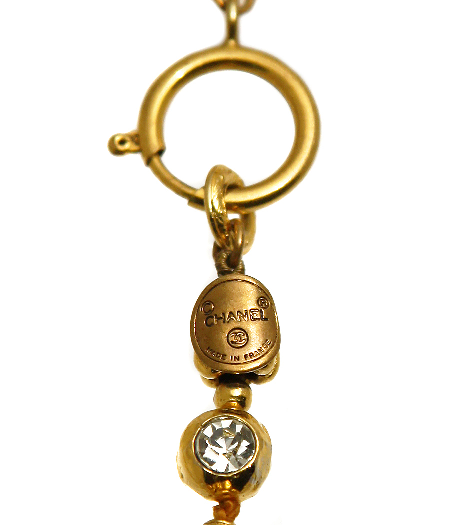 Колье Chanel с золотистой кистью и кристаллами