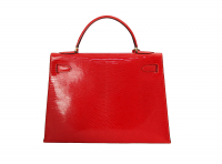 Красная сумка Hermès Kelly 32 из кожи ящерицы