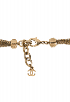 Золотистое колье Chanel с цветами