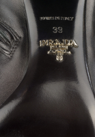 Кожаные ботфорты Prada