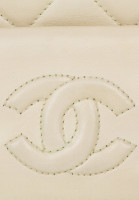 Кремовая сумка Chanel Tassel Camera Bag