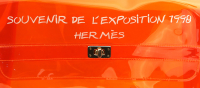 Оранжевая виниловая сумка Hermès Kelly