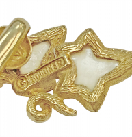 Золотистые клипсы Boucheron